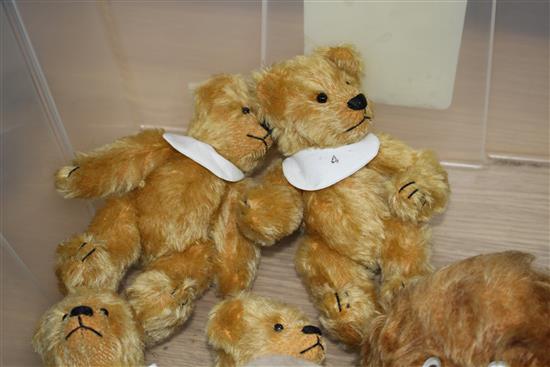 A group of assorted soft toys including teddy bears